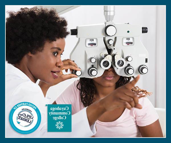Photo of two individuals in an eye examination