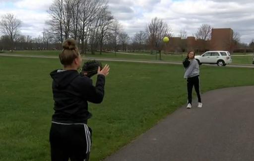 Breanna Musick and Cassandra Fendrick playing catch.